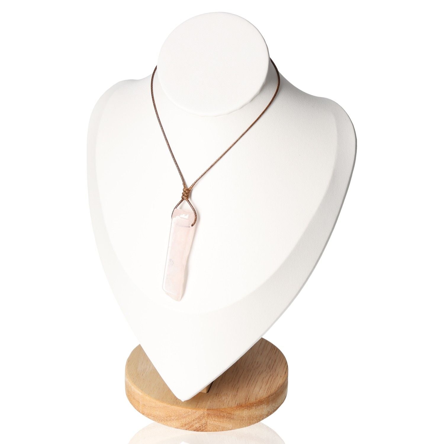 Boho rose quartz necklace on display bust, featuring a pendant symbolizing unconditional love and tranquility.