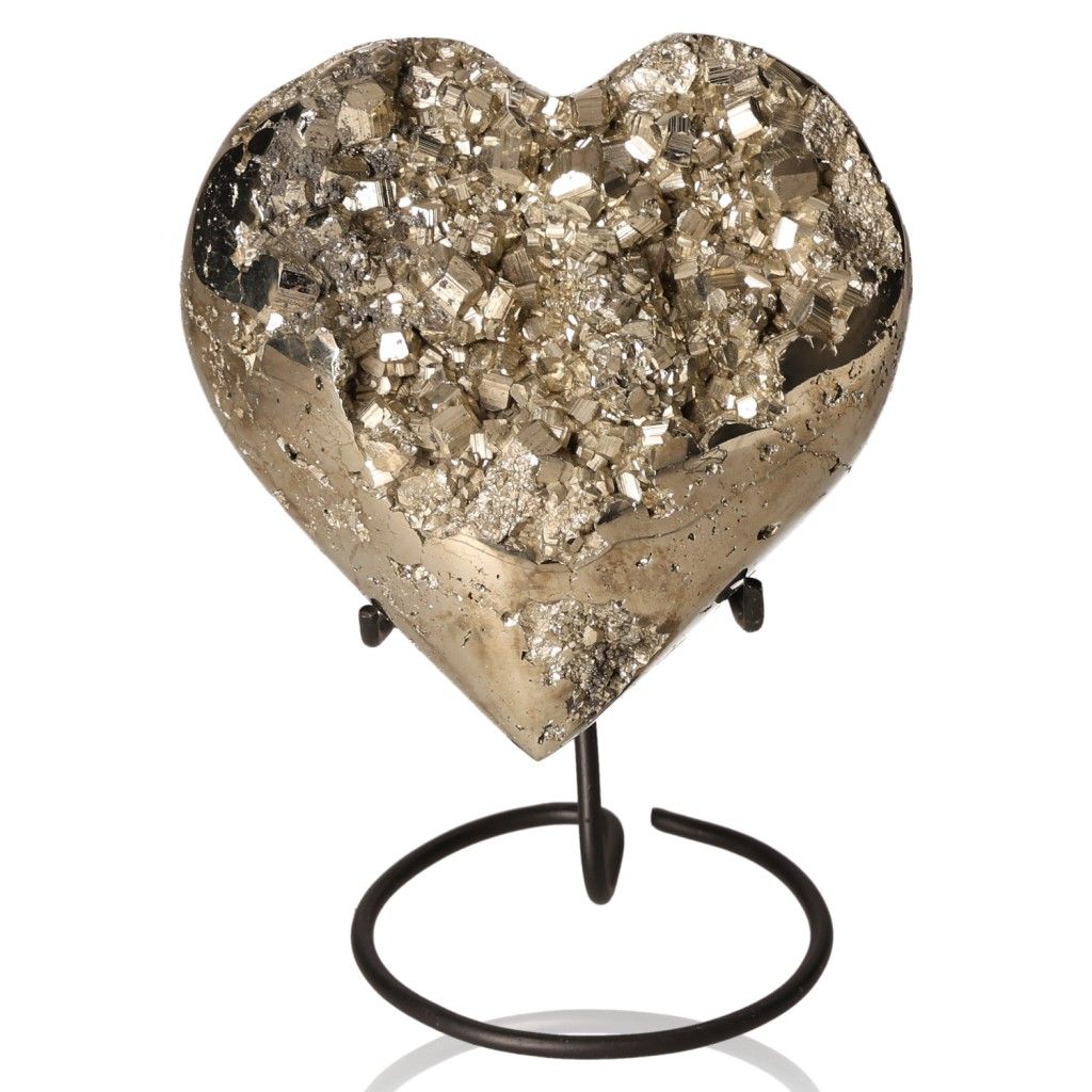 Pyrite heart stone on stand, promoting independence and inspiring courage for new ideas and goal achievement.